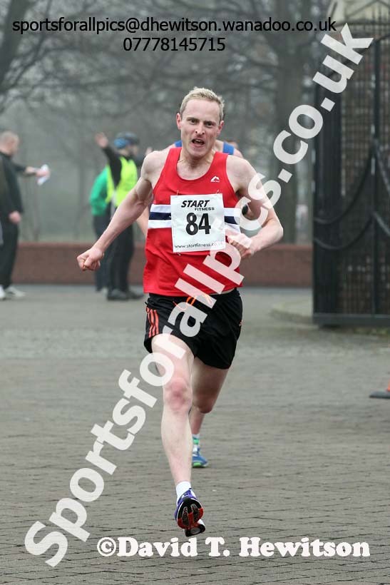 Graeme Cook (NSP) finishing the Wallsend Harriers Terry O'Gara 5k Memorial Road Race. Photo: David T. Hewitson/Sports for All Pics